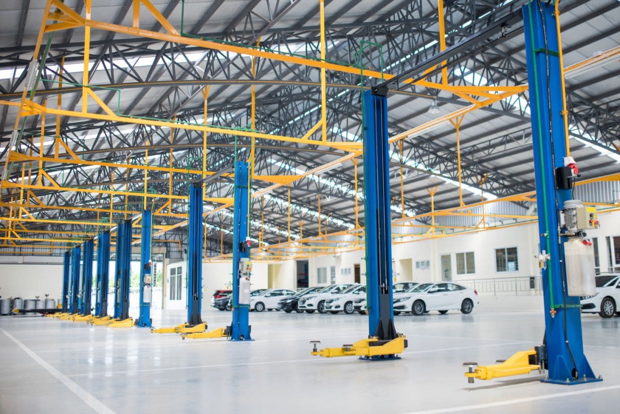 electric lift cars service put epoxy floor new car factory service