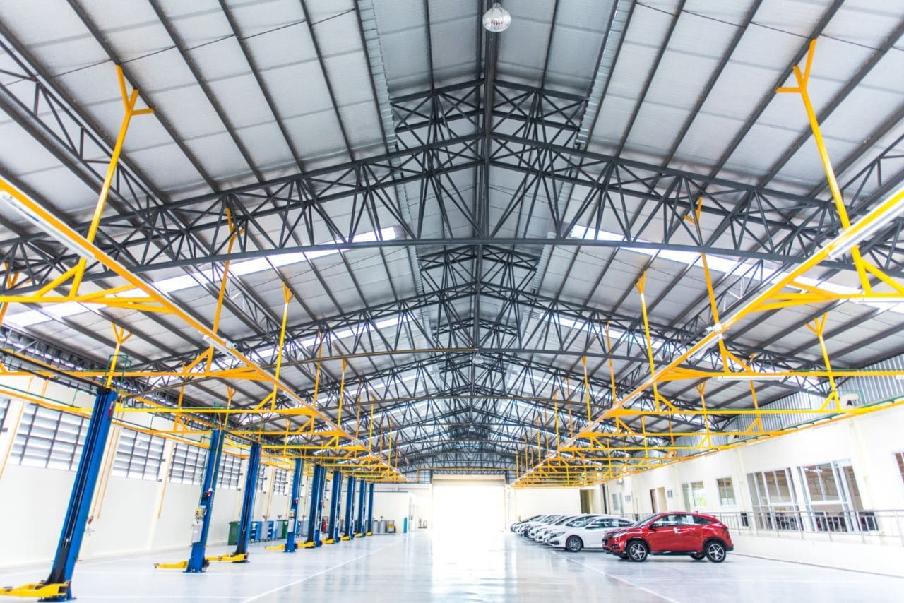 interior decoration is epoxy floor industrial building large automobile repair center with steel roof structure